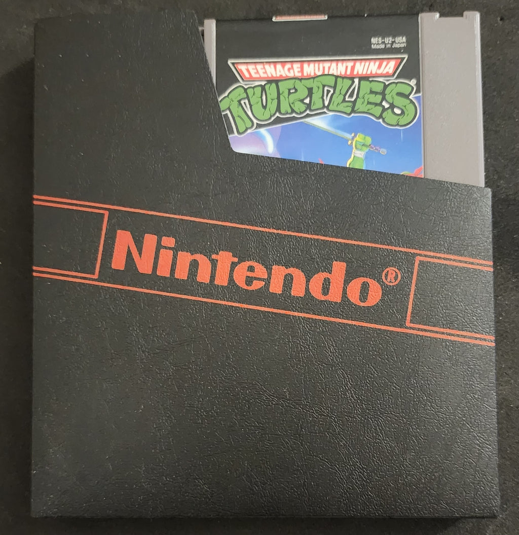 Nintendo NES Teenage Mutant Ninja Turtles Cartridge Only with Dust Cover (1989)